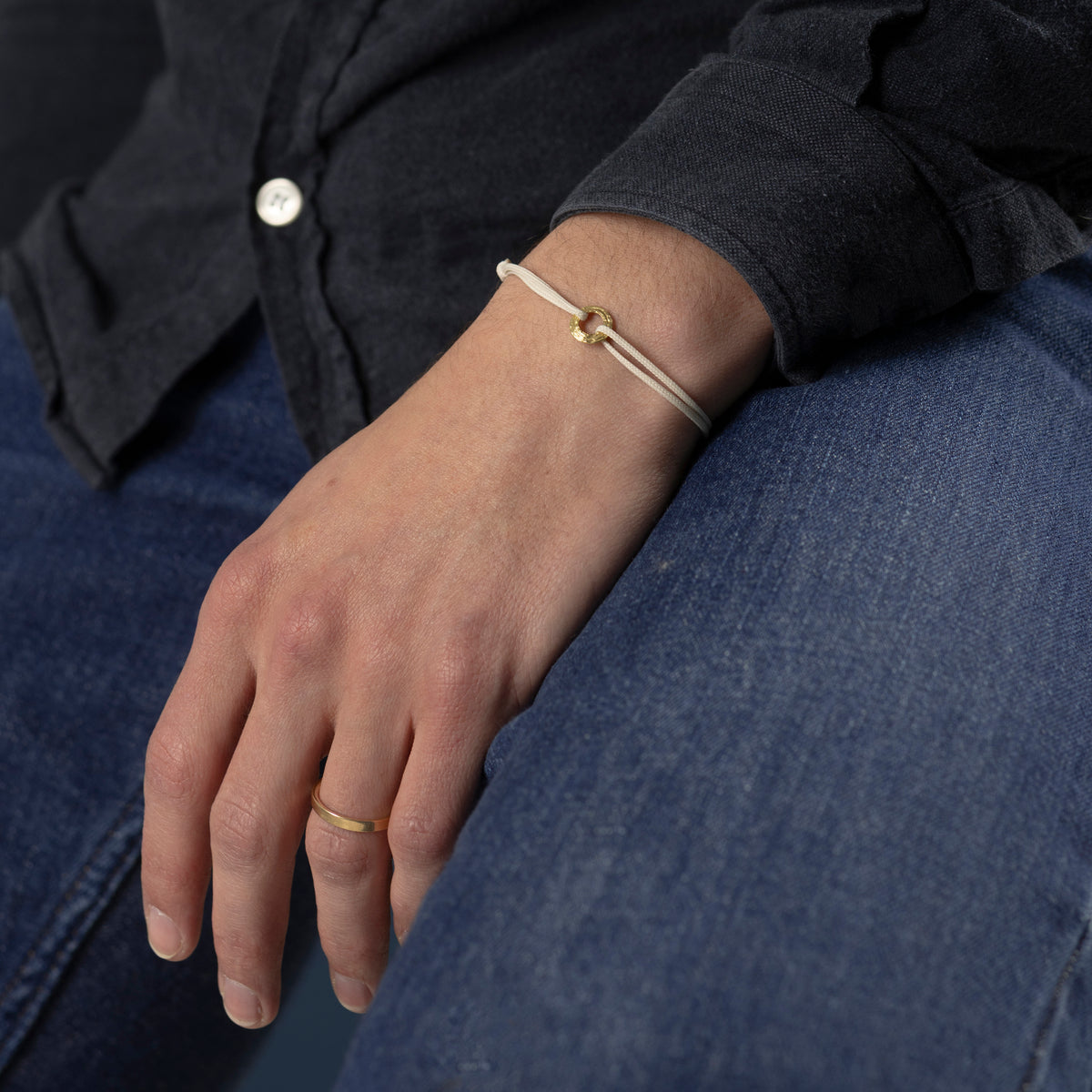 Gold and cord bracelet