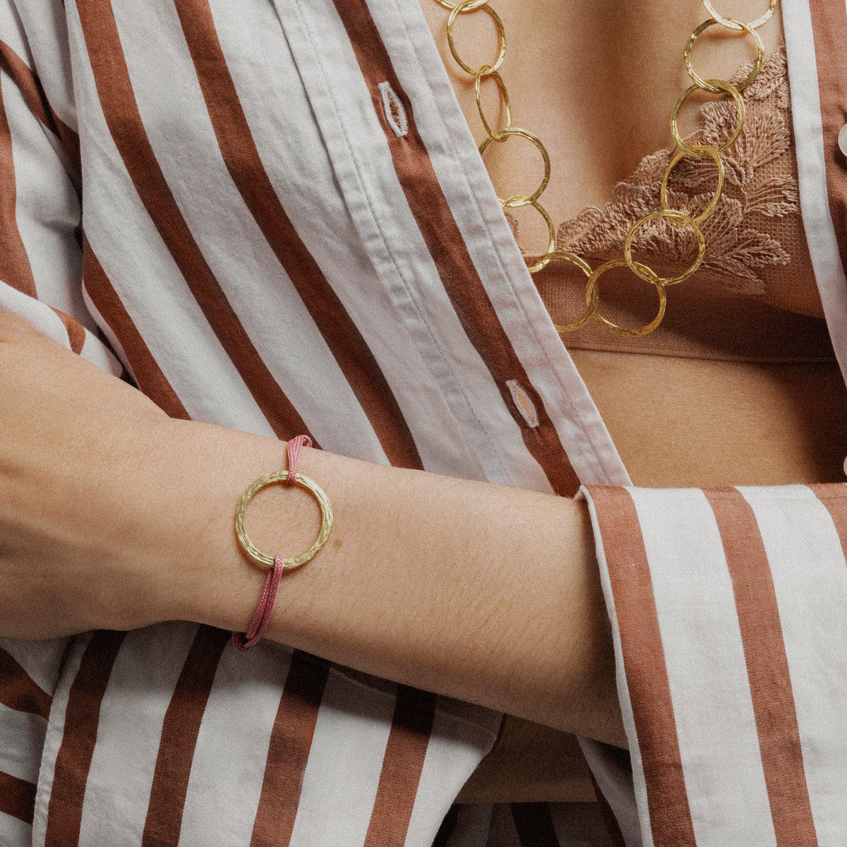 Gold and cord bracelet